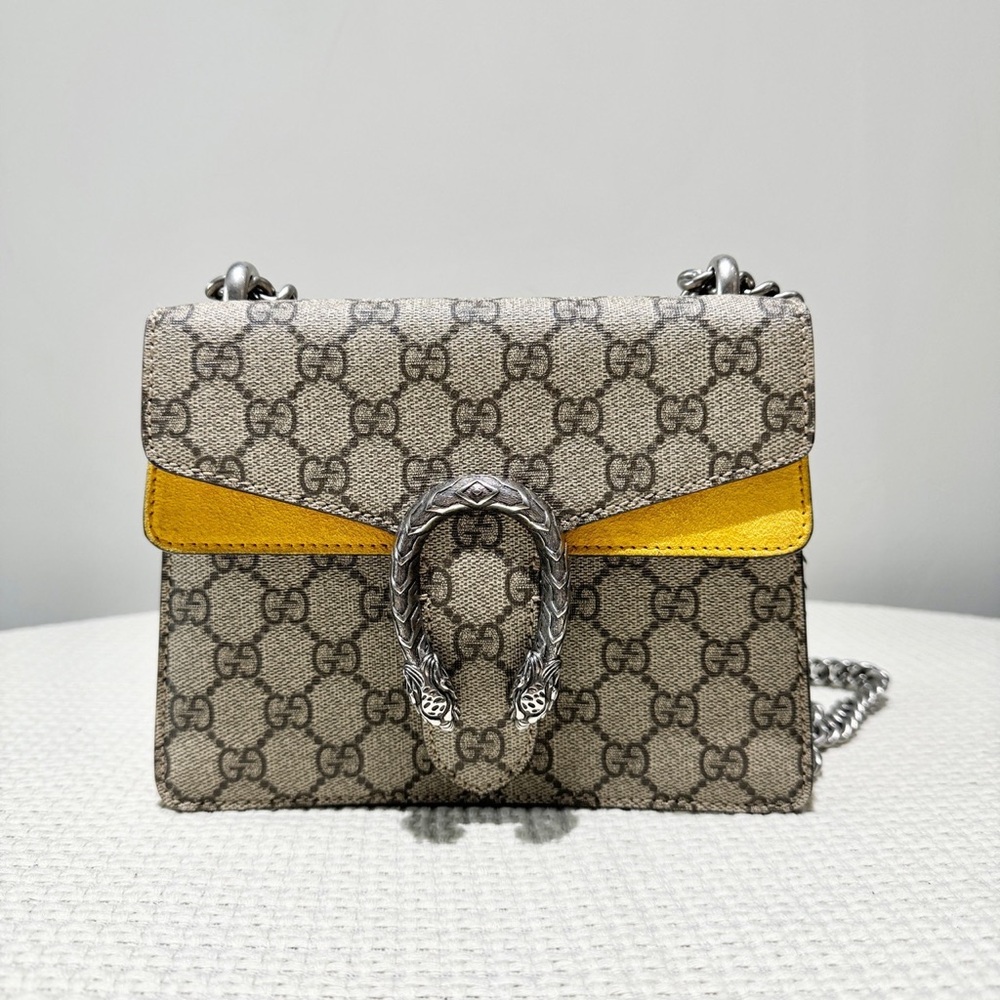 Gucci Bacchanalia series yellow small size new condition basically flawless